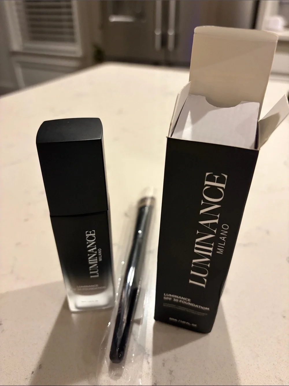 NWT Luminance SPF 30 Foundation, light color with brand new brush.